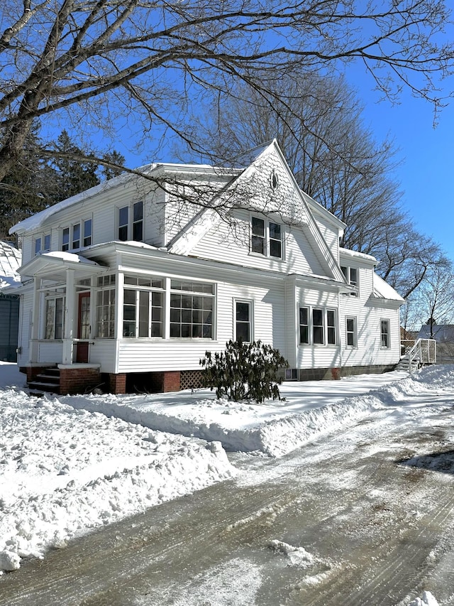 13 Maple St, Skowhegan, ME 04976 - view of front facade with a sunroom