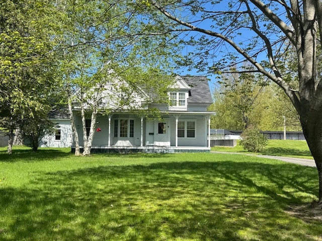4 Blockhouse Rd, Fort Kent, ME 04743 - view of front facade with a porch and a front yard