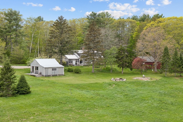 463 Back Meadow Rd, Damariscotta, ME 04543 - view of grassy yard with an outbuilding and a view of trees