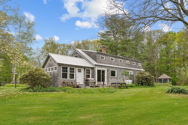 463 Back Meadow Rd, Damariscotta, ME 04543 - rear view of property with a lawn and a chimney