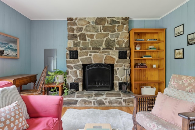 463 Back Meadow Rd, Damariscotta, ME 04543 - living area featuring ornamental molding, a fireplace, and wood finished floors