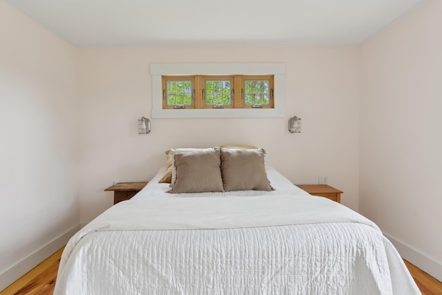 463 Back Meadow Rd, Damariscotta, ME 04543 - bedroom with baseboards and wood finished floors