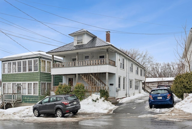 view of front of property with a chimney