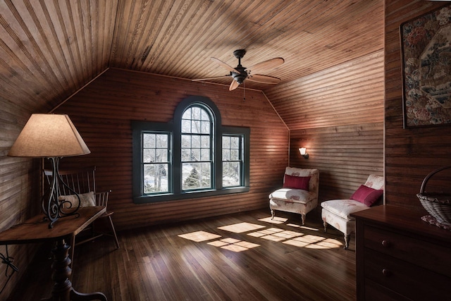 sitting room featuring wood ceiling, ceiling fan, wood-type flooring, and vaulted ceiling