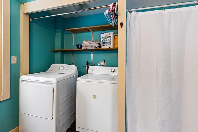 clothes washing area with laundry area and separate washer and dryer