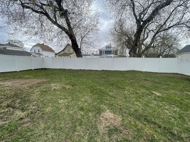 view of yard with fence