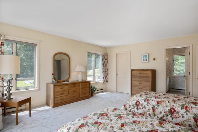 bedroom with multiple windows and carpet