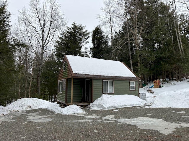 view of snow covered garage