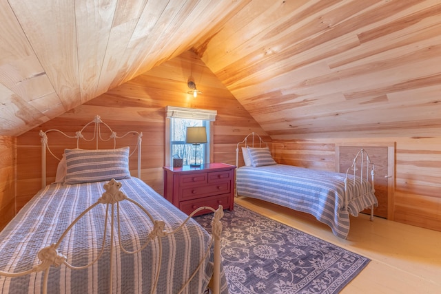 bedroom featuring wooden ceiling, wooden walls, wood finished floors, and vaulted ceiling