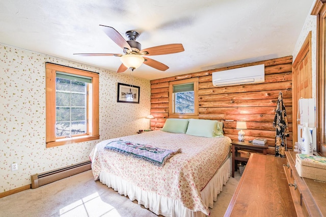 bedroom with log walls, light colored carpet, baseboard heating, a wall mounted AC, and wallpapered walls