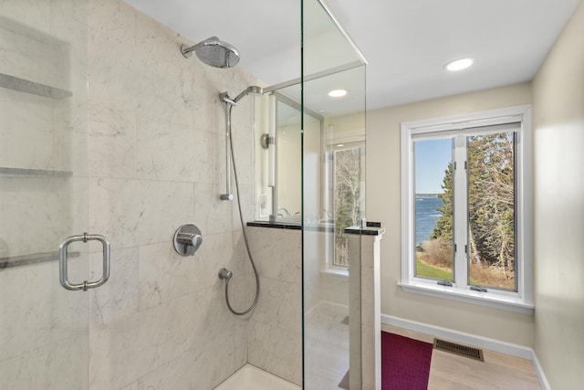 825 Hendricks Hill Rd, Southport, ME 04576 - full bath featuring a stall shower, baseboards, wood finished floors, and recessed lighting