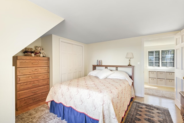 825 Hendricks Hill Rd, Southport, ME 04576 - bedroom with wood finished floors and a closet