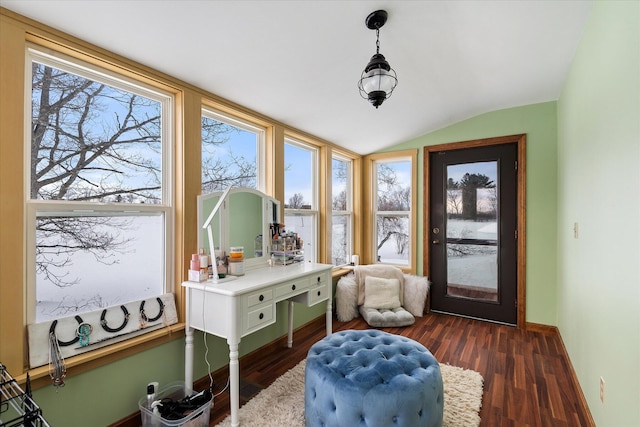 sunroom featuring vaulted ceiling