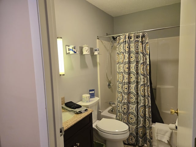 full bath with toilet, shower / bath combo with shower curtain, and vanity