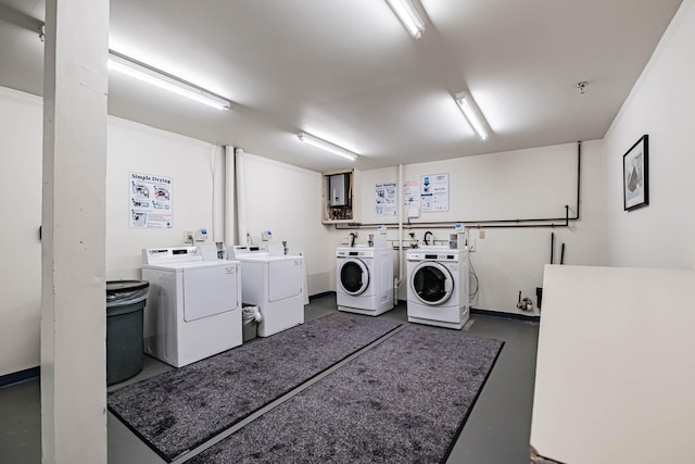 common laundry area featuring washing machine and clothes dryer