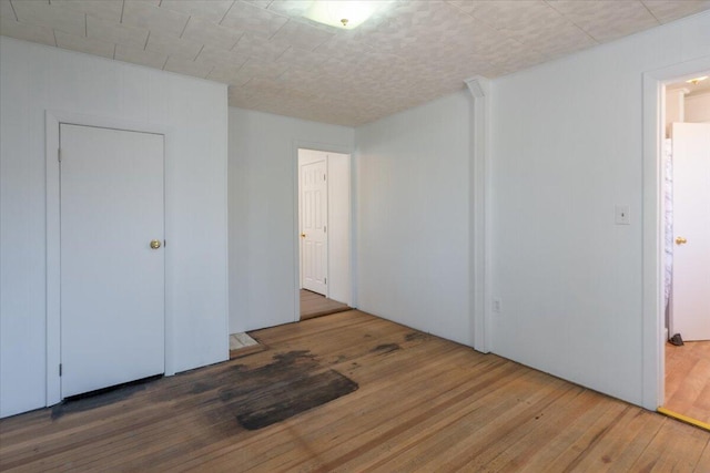 332 Back River Rd, Boothbay, ME 04537 - unfurnished bedroom featuring hardwood / wood-style flooring