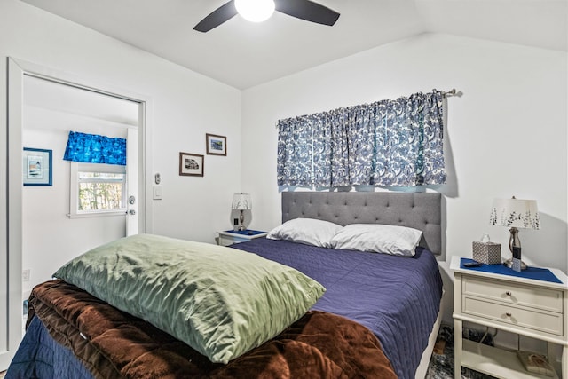 bedroom with ceiling fan and vaulted ceiling