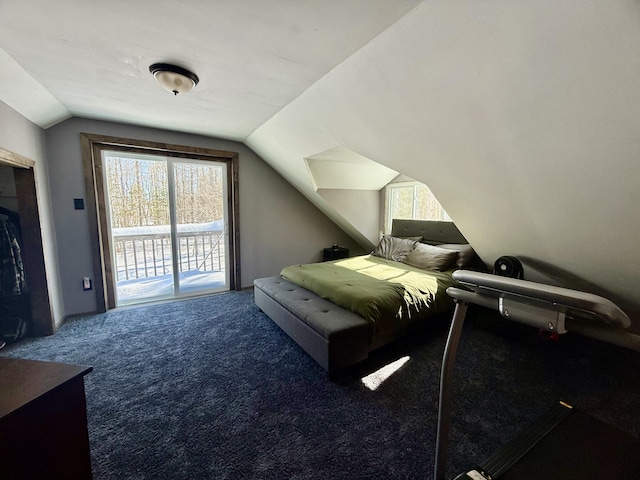 carpeted bedroom featuring access to outside and lofted ceiling