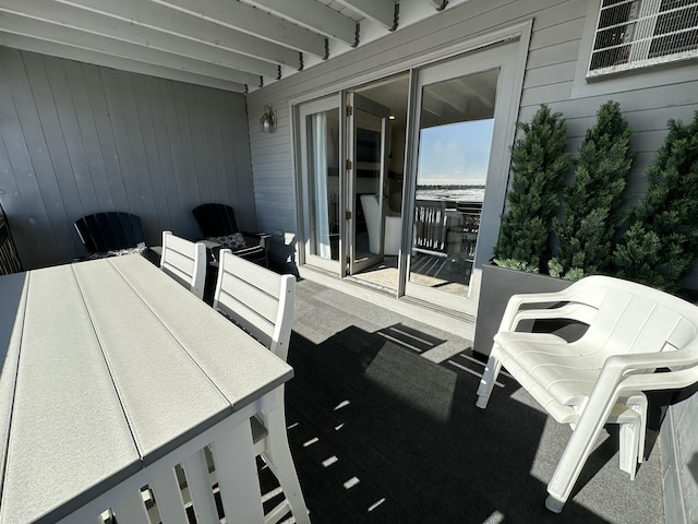 view of patio / terrace with outdoor dining area and visible vents