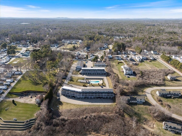 1801 Post Rd Unit 128, Wells, ME 04090 - birds eye view of property featuring a view of trees