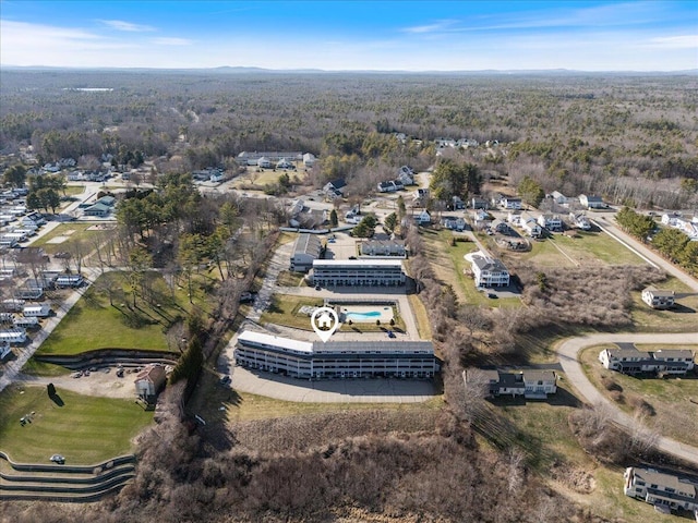 1801 Post Rd Unit 128, Wells, ME 04090 - birds eye view of property with a wooded view