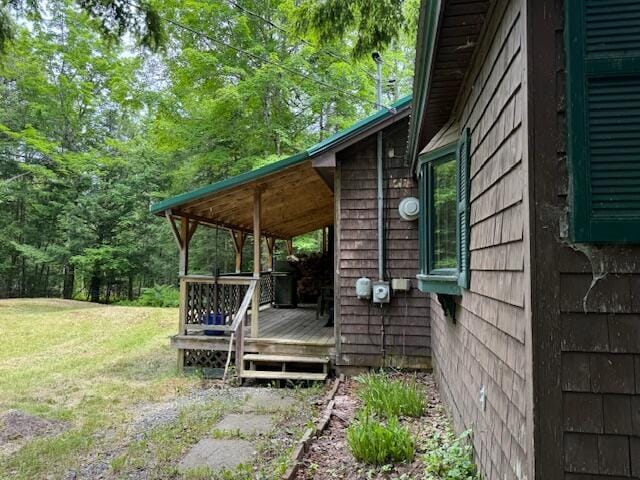 view of home's exterior with a yard