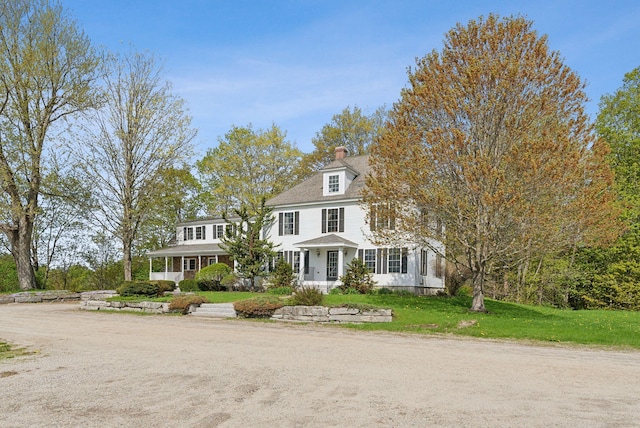 49 Megquier Rd, Gray, ME 04039 - shingle-style home with a chimney and a front lawn