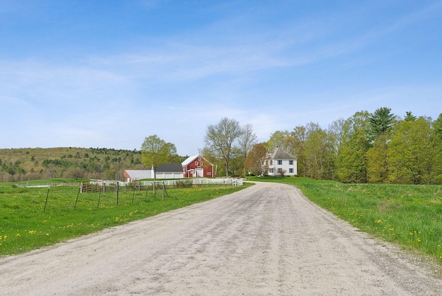 49 Megquier Rd, Gray, ME 04039 - view of dirt / gravel driveway with a rural view and a barn