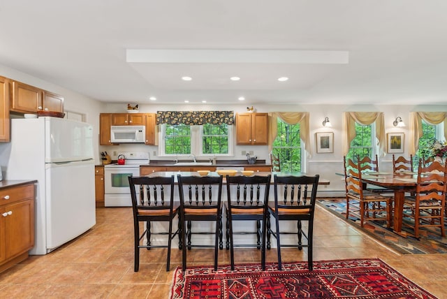 49 Megquier Rd, Gray, ME 04039 - kitchen featuring white appliances, plenty of natural light, a sink, light tile patterned floors, and recessed lighting