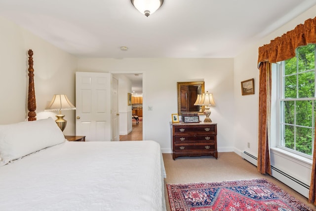 49 Megquier Rd, Gray, ME 04039 - bedroom with light carpet, baseboards, and a baseboard heating unit