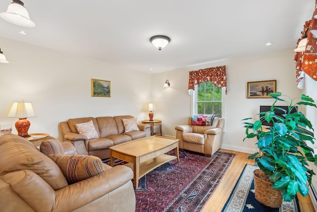 49 Megquier Rd, Gray, ME 04039 - living room with wood finished floors, recessed lighting, and baseboards