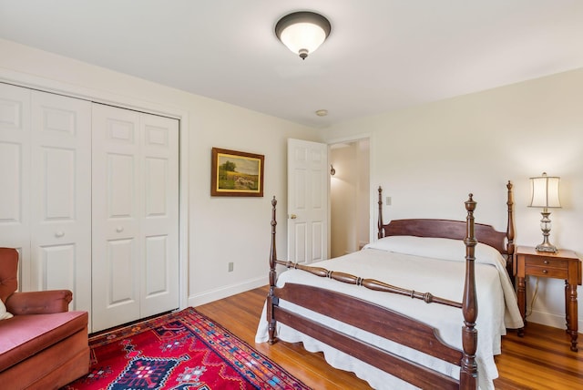 49 Megquier Rd, Gray, ME 04039 - bedroom with wood finished floors, a closet, and baseboards