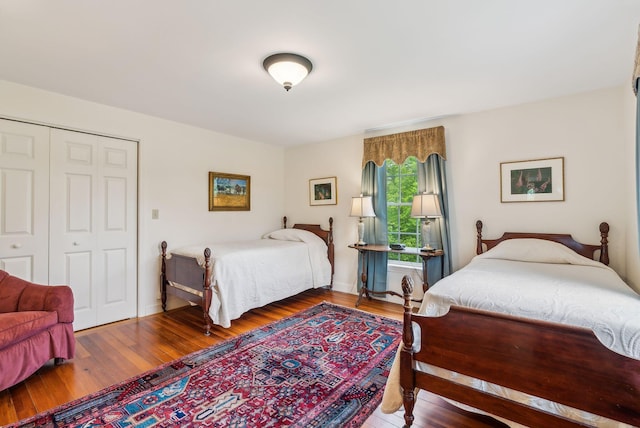 49 Megquier Rd, Gray, ME 04039 - bedroom with wood finished floors, a closet, and baseboards
