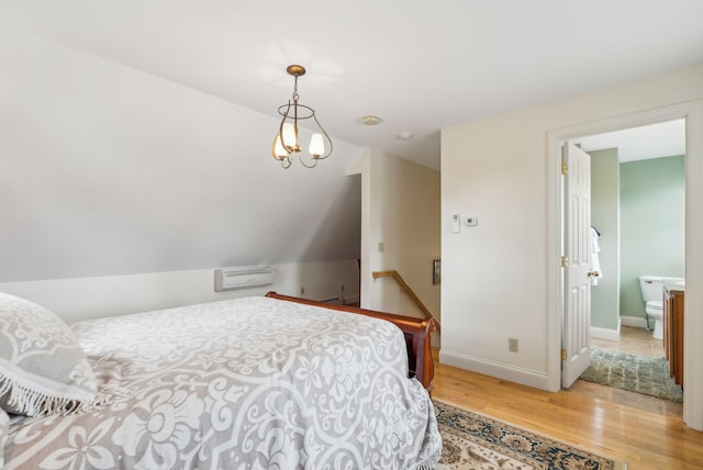 49 Megquier Rd, Gray, ME 04039 - bedroom with light wood finished floors, baseboards, and a chandelier