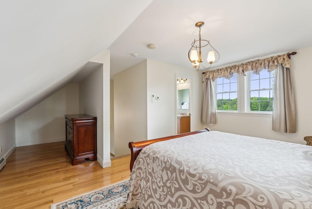 49 Megquier Rd, Gray, ME 04039 - bedroom featuring light wood-style floors, a chandelier, baseboards, and vaulted ceiling