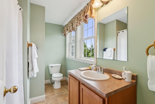 49 Megquier Rd, Gray, ME 04039 - full bathroom with vanity, toilet, and baseboards