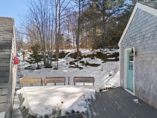 view of snow covered deck