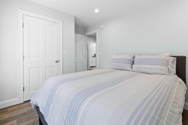 bedroom with baseboards, wood finished floors, and recessed lighting