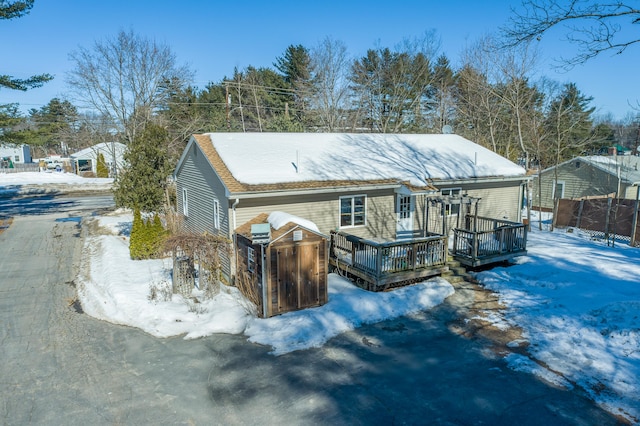 view of front of property featuring a wooden deck