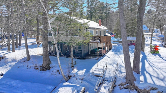 exterior space featuring a wooden deck