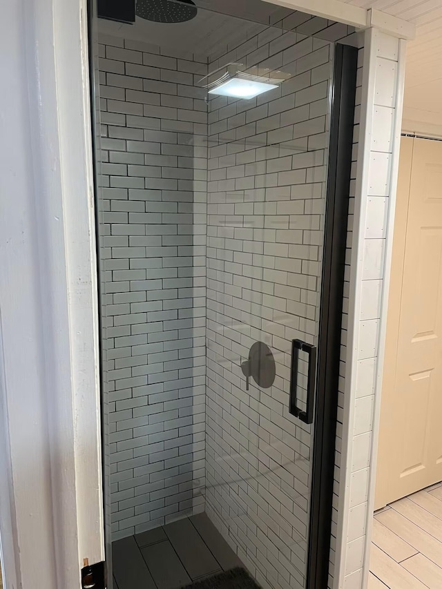 bathroom featuring a stall shower