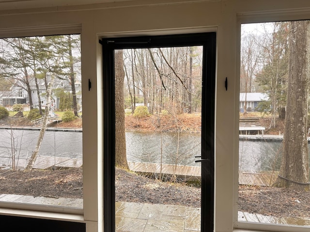 7 Birch Dr, Raymond, ME 04071 - doorway to outside with a wealth of natural light and a water view