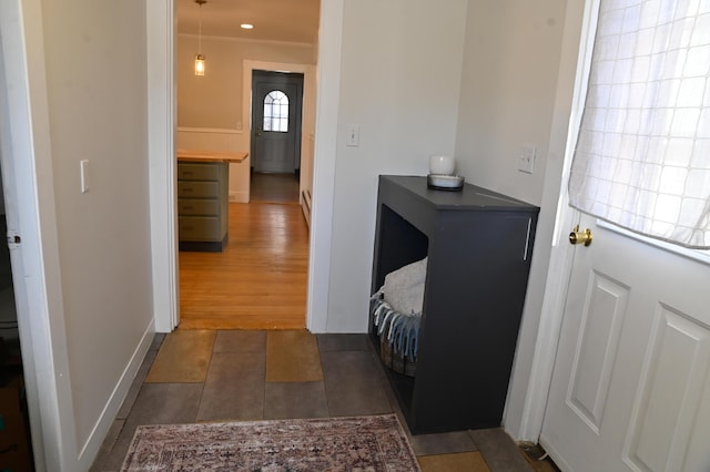 hall with tile patterned flooring