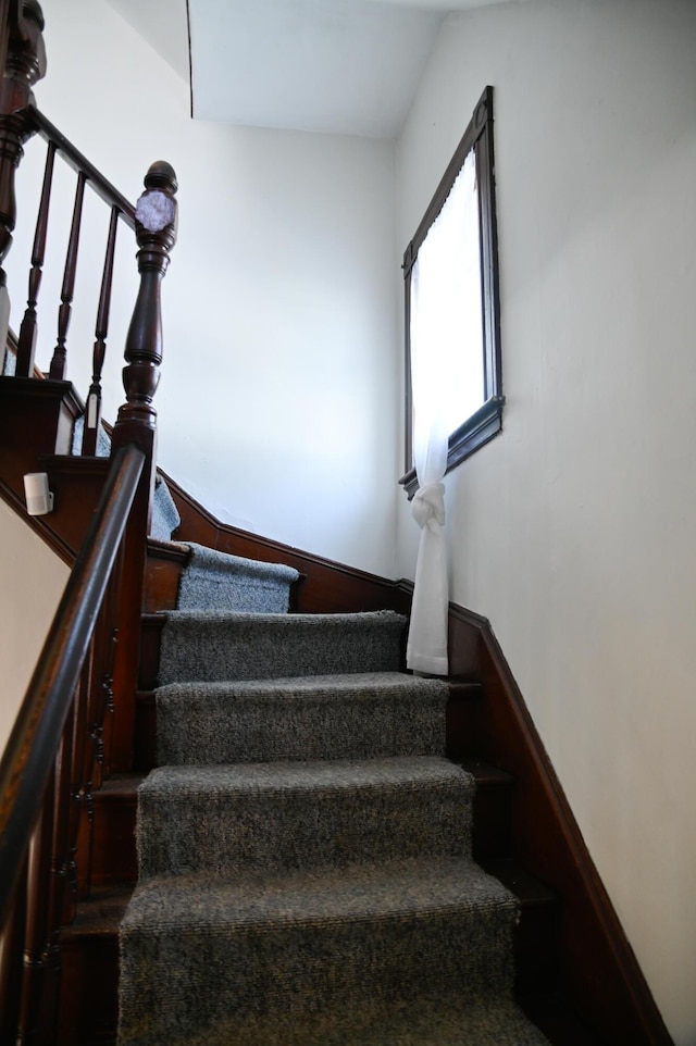 staircase with baseboards