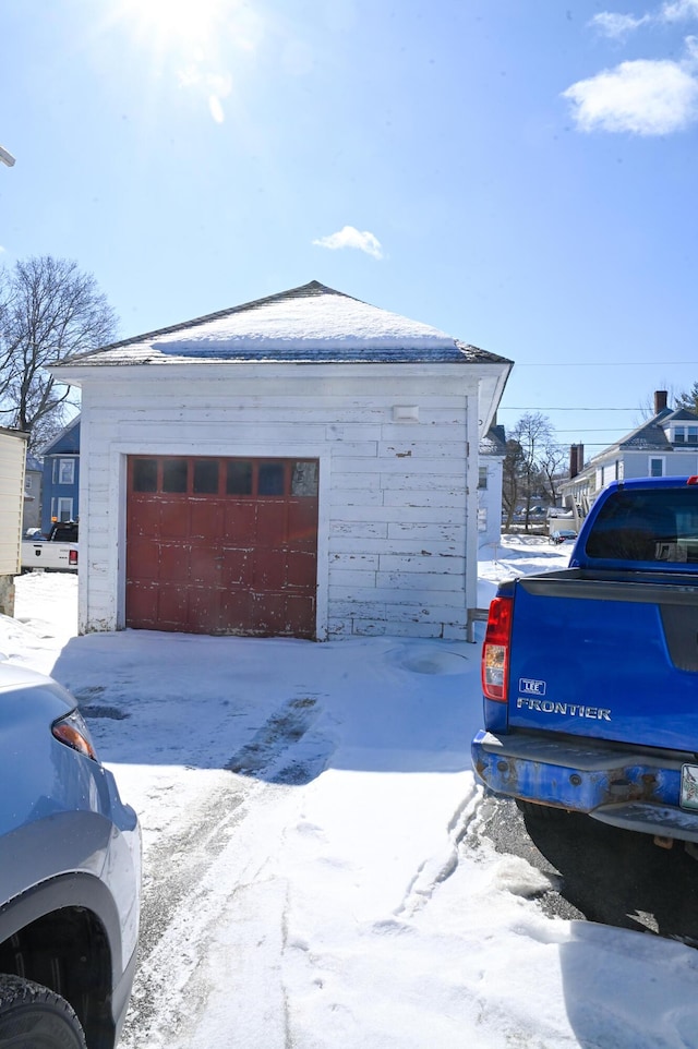 view of snow covered garage