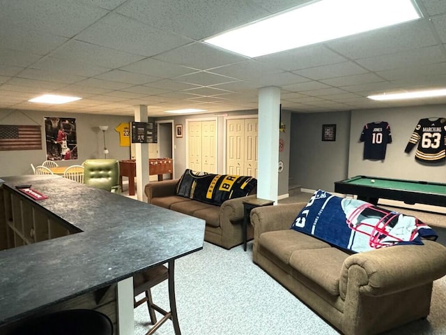 living room featuring carpet, a paneled ceiling, and billiards