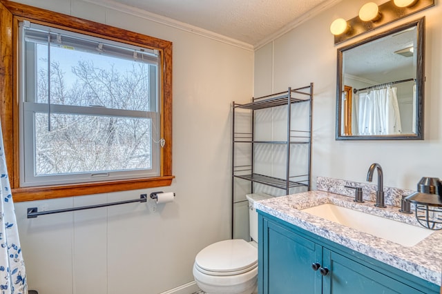 bathroom with a textured ceiling, curtained shower, toilet, vanity, and crown molding