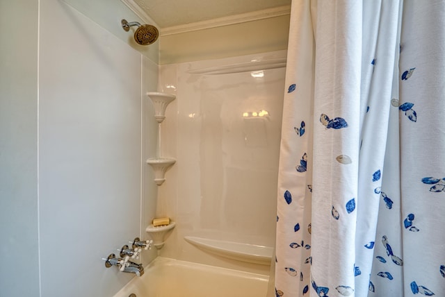 bathroom featuring shower / bath combo and ornamental molding