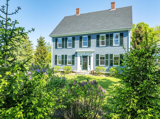 174 Barrett Hill Rd, Union, ME 04862 - colonial house featuring a chimney and a shingled roof