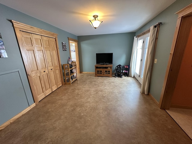 living room featuring baseboards